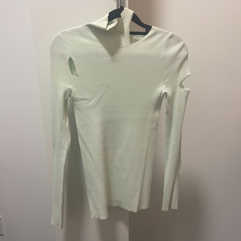 TIBI GISELLE SLIT TURTLENECK. SIZE XS